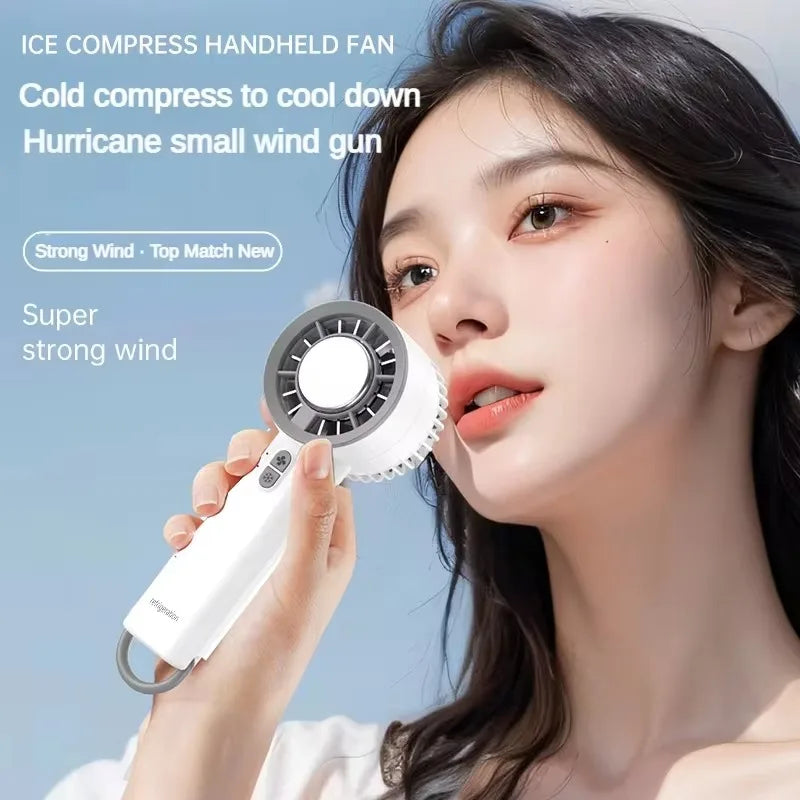 Ice Compress Mini Fan – USB Rechargeable Handheld Turbo Fan with Semiconductor Cooling Technology